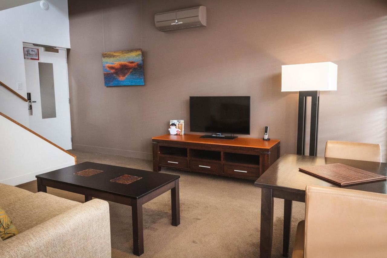 The Henry Jones Art Hotel Hobart Exterior foto A living room in a typical apartment at the Village at Grand Traverse Commons